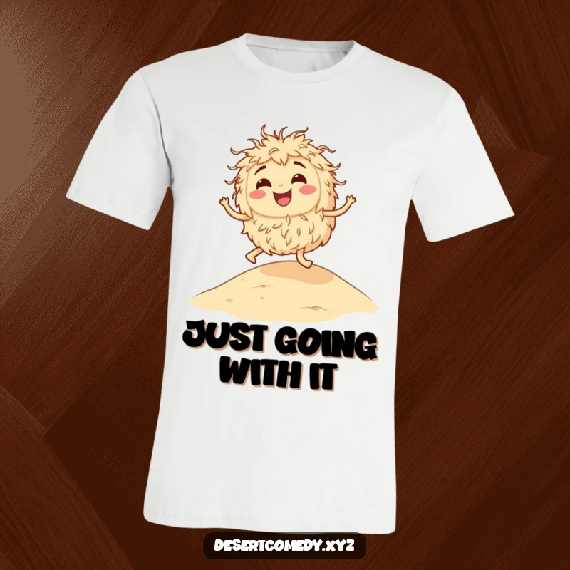 Funny t-shirt showing a cheerful tumbleweed mid-bounce on a sandy desert dune, capturing a moment of pure, carefree fun.